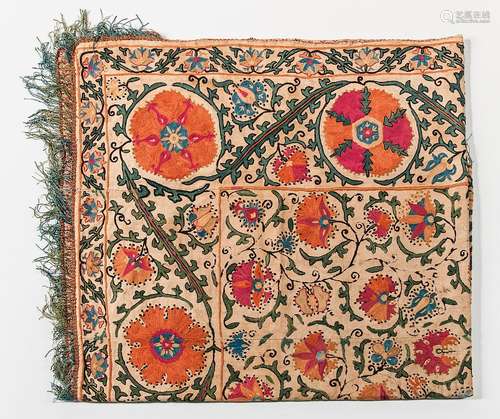 Suzani Embroidery, Central Asia, 19th/20th century, decorated with floral roundels in chain stitch, and two woven and embroidered bags,