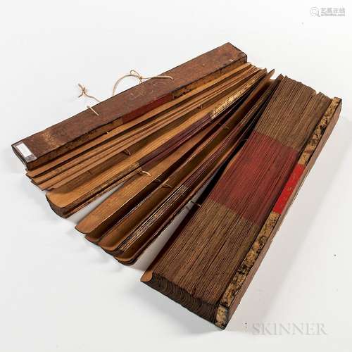 Pali Palm-leaf Buddhist Manuscripts, Burma, 19th/20th century, with more than 200 palm leaf strips, strung with two lacquered giltwood