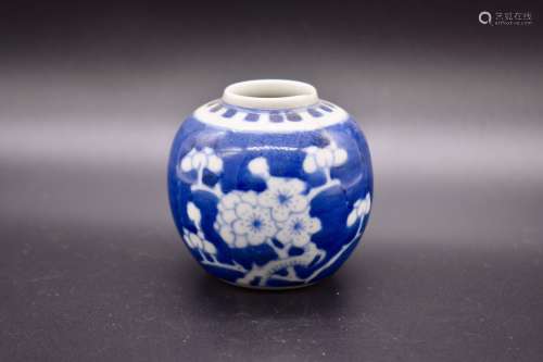 A small Chinese Kangxi period blue and white prunus jar- 18th century