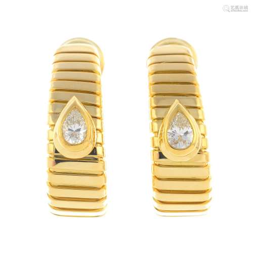 BULGARI - a pair of 18ct gold diamond 'Tubogas' earrings.