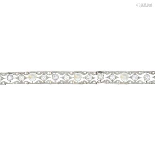 A mid 20th century platinum diamond and cultured pearl bracelet.