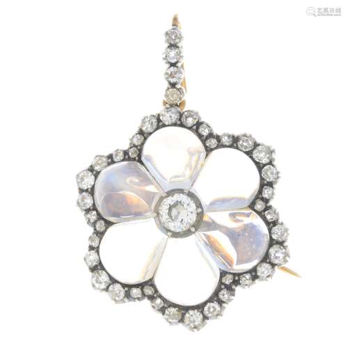 A late Victorian silver and gold, diamond and moonstone floral pendant.