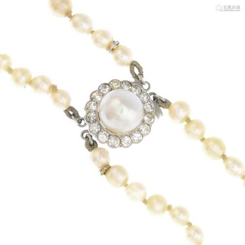 An early 20th century natural pearl two-row necklace.