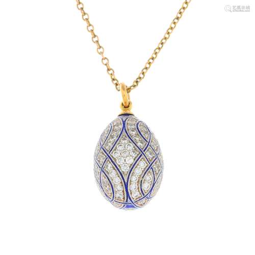 A diamond and enamel egg pendant, with chain.