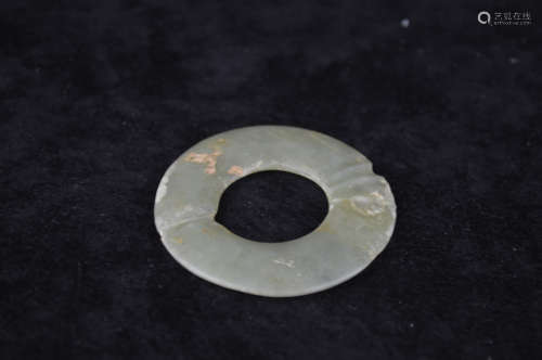 A JADE CARVED RING-SHAPED PENDANT