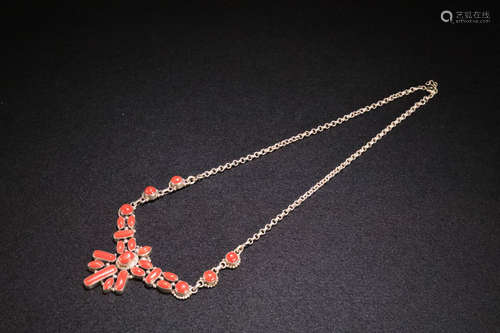 AN OLD TIBETAN CORAL NECKLACE