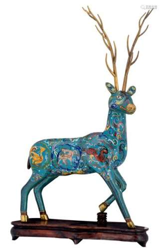 A Chinese cloisonné deer on a wooden base, H 75 (w...;