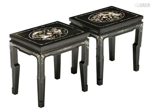 A pair of black lacquered stools, with a mother of...;