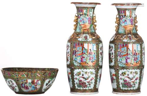 A pair of Chinese Canton vases, decorated with fig...;