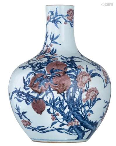 A Chinese underglaze blue and copper red decorated...;