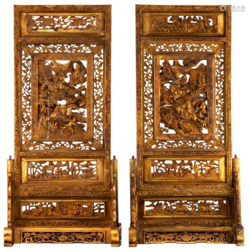 Two Chinese richly carved gilt lacquered wooden ta...;