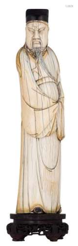 An ivory statue, depicting a Chinese scholar on a ...;