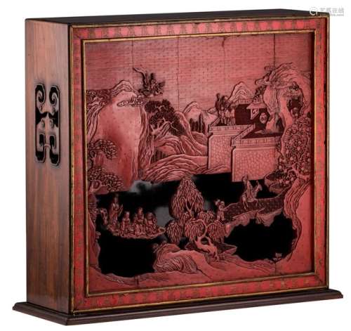 A Chinese reverse red and black lacquered wooden t...;