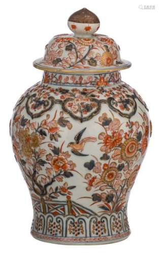 A Chinese Imari and relief decorated covered jar, ...;