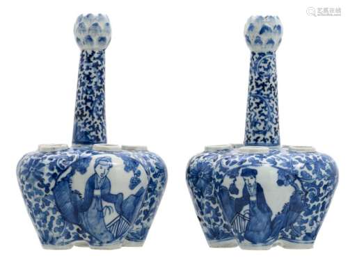 A pair of Chinese blue and white floral and relief...;