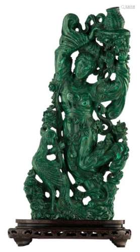 A Chinese richly carved malachite group, depicting...;