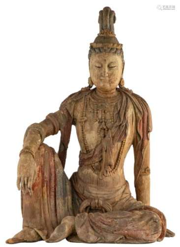 Guanyin Pusa (Sk. Avalokitesvara) sits in dawang y...;