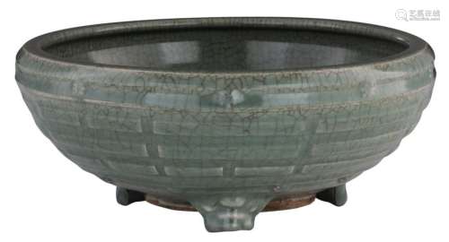 A Chinese celadon glazed incense burner on three a...;