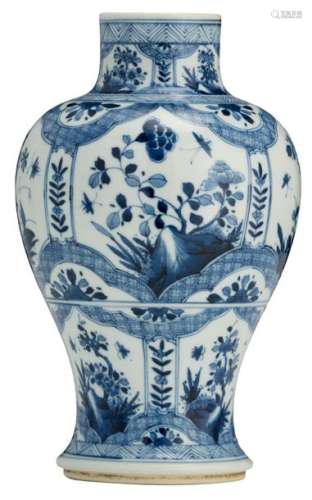 A Chinese blue and white baluster shaped vase, the...;