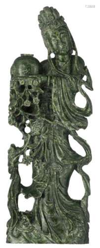 A Chinese carved spinach jade figure, depicting a ...;