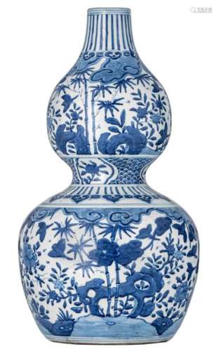 A Chinese blue and white double gourd vase, decora...;