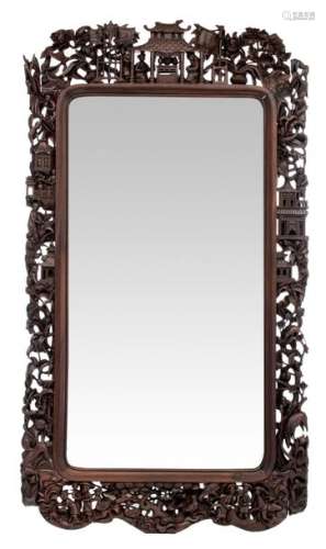 A Chinese richly carved wooden frame mirror, decor...;