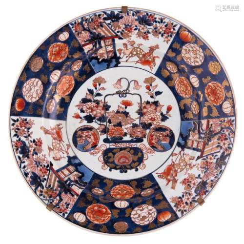 A large Japanese Arita Imari charger, decorated in...;