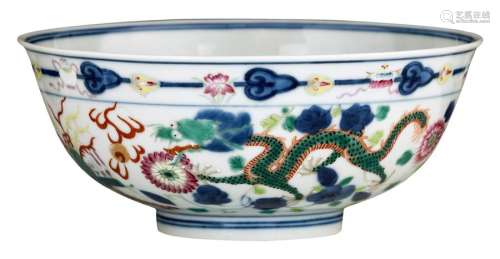A Chinese polychrome bowl, decorated with flowers ...;