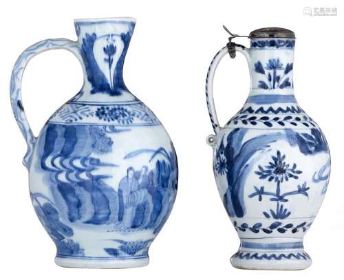 Two Japanese Arita blue and white jugs, decorated ...;