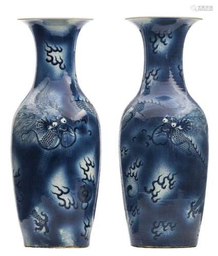 A pair of Chinese blue and white vases, decorated ...;