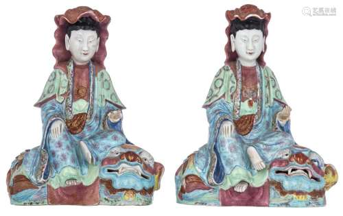 A pair of Chinese famille rose Guanyin, seated upo...;