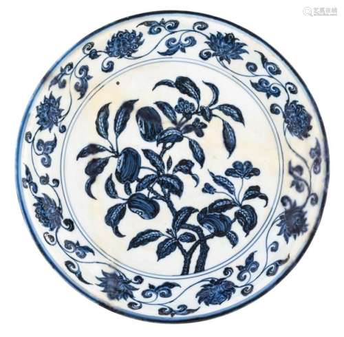 A Chinese blue and white charger, floral decorated...;
