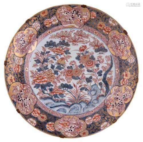 A large Edo period Japanese Imari plate, the centr...;