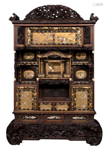 A rare richly carved Meiji period Japanese cabinet...;