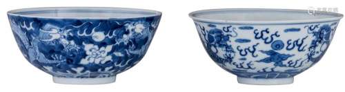 Two Chinese blue and white dragon decorated bowls,...;