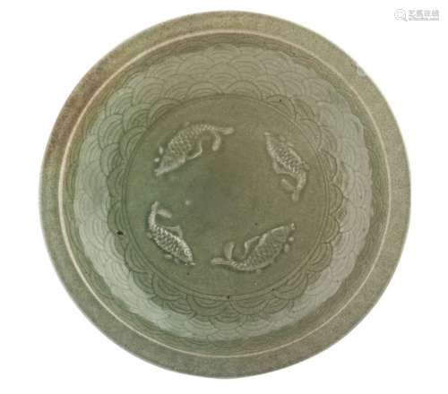 A Chinese celadon stoneware plate with small rim, ...;