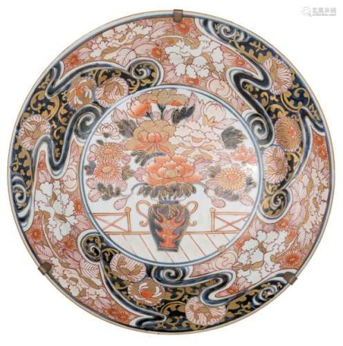 A large Japanese Arita Imari plate, the centre dec...;