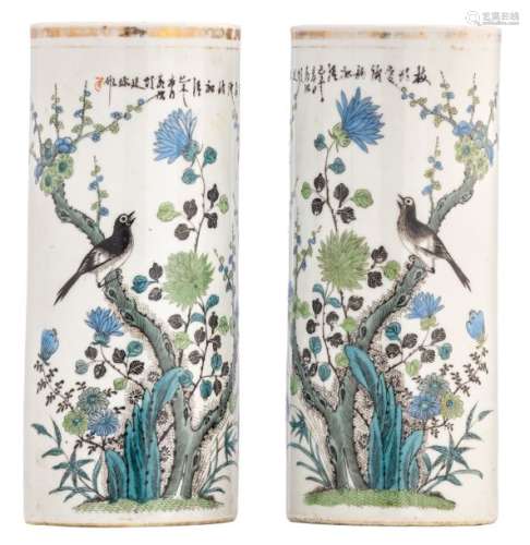 A pair of Chinese polychrome cylindrical vases, de...;