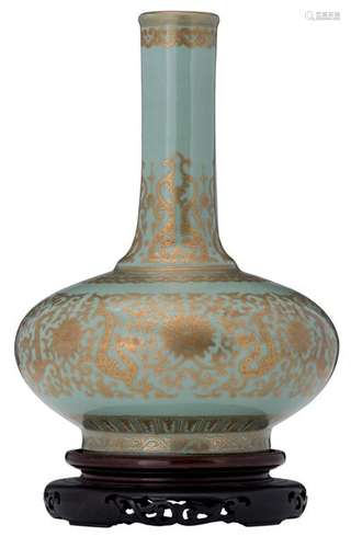 A Chinese celadon ground gilt decorated bottle vas...;