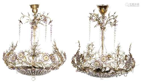 A pair of chandeliers of the sac à perles type wit…