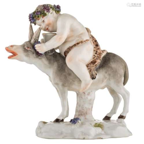 A polychrome decorated Bacchus riding his donkey, …
