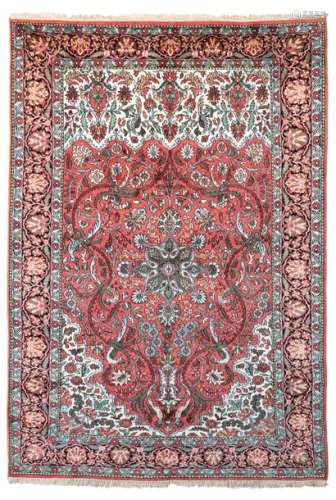 An Oriental silk carpet, 178 x 258 cm
