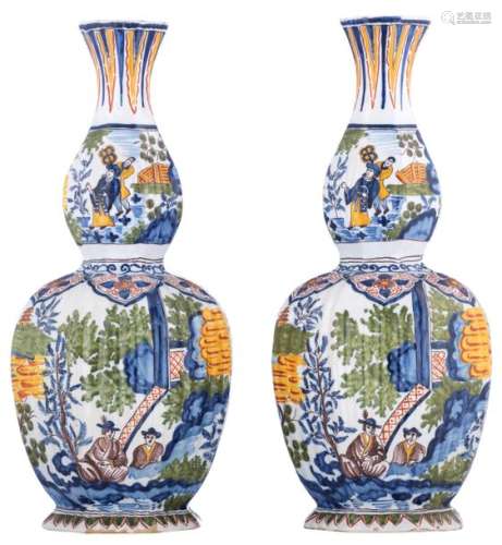 A pair of polychrome Delftware vases with a chinoi…