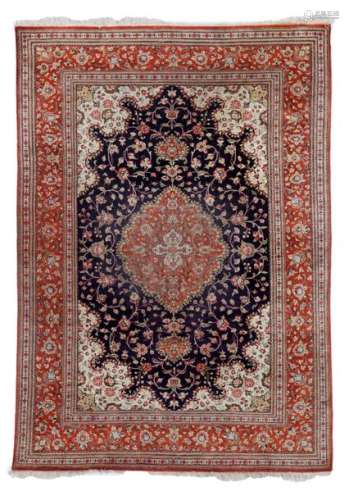 An Oriental silk carpet with floral motifs, 138 x …