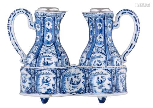 A blue and white decorated Dutch Delftware oil and…