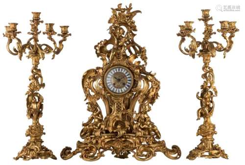 An impressive Rococo Revival three piece gilt bron…