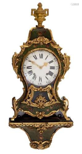A pine rococo cartel clock on a ditto base, flower…