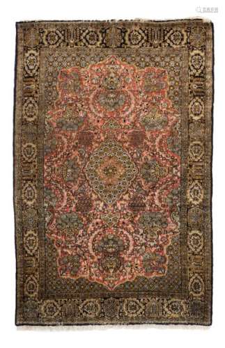 An Oriental silk carpet with floral motifs, 110 x …