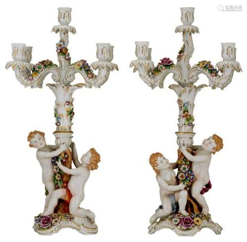 An imposing pair of polychrome decorated Saxony po…