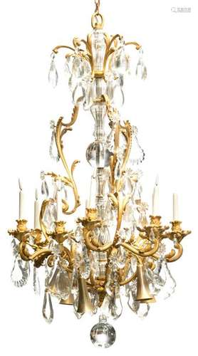 An imposing gilt bronze chandelier with crystal de…